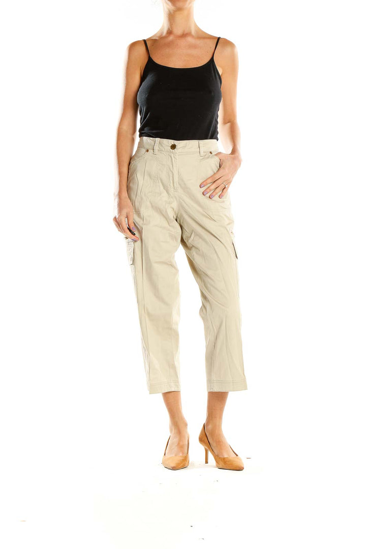 Front view of Cache beige cropped cargo pants on model