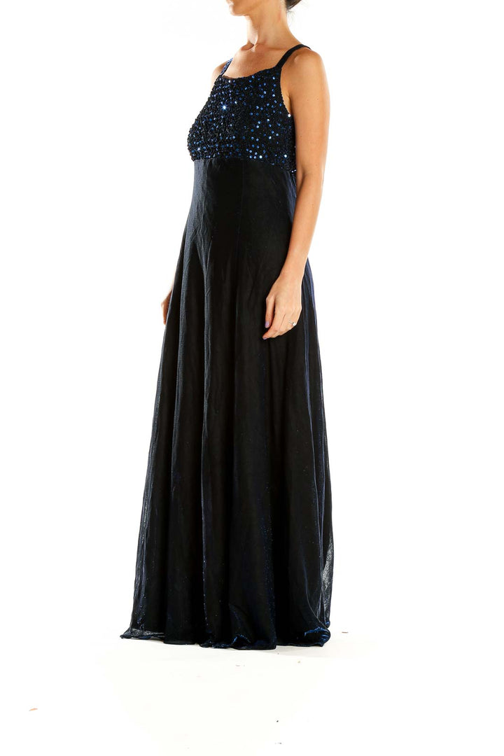Front view of Betsy & Adam navy maxi dress with sequined bodice and empire waist