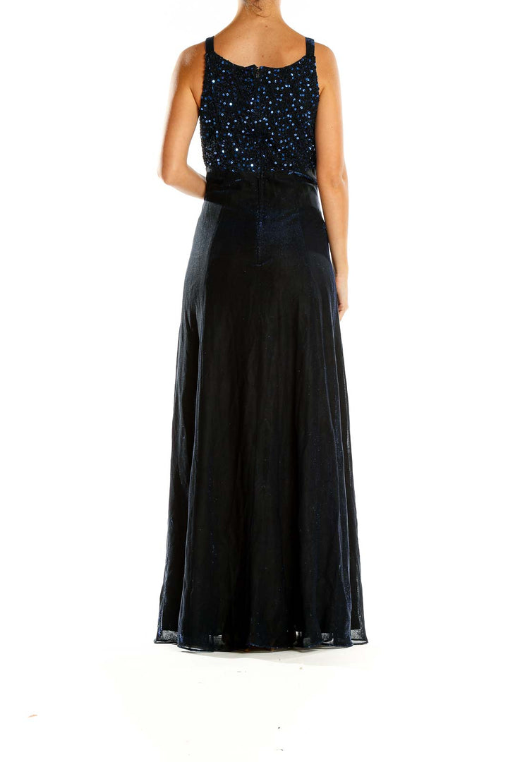 Back view of Betsy & Adam navy maxi dress showing full-length flowing skirt