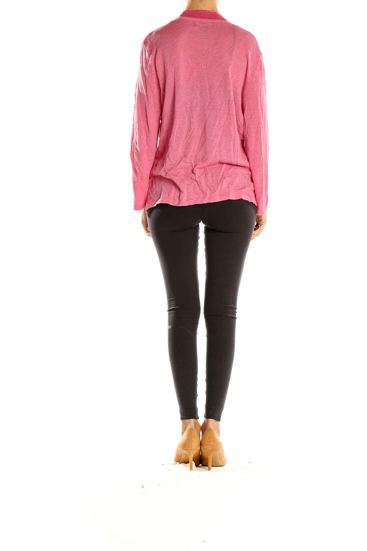 Side view of pink open-front knit cardigan by Jones New York on model