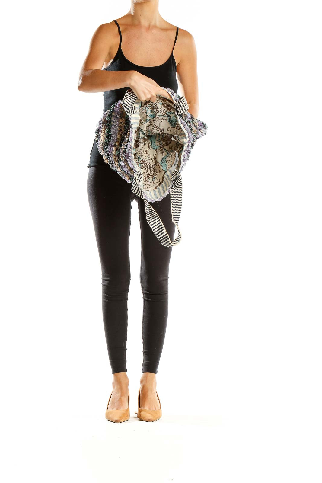 Side view of model carrying Maaji multicolor textured tote bag