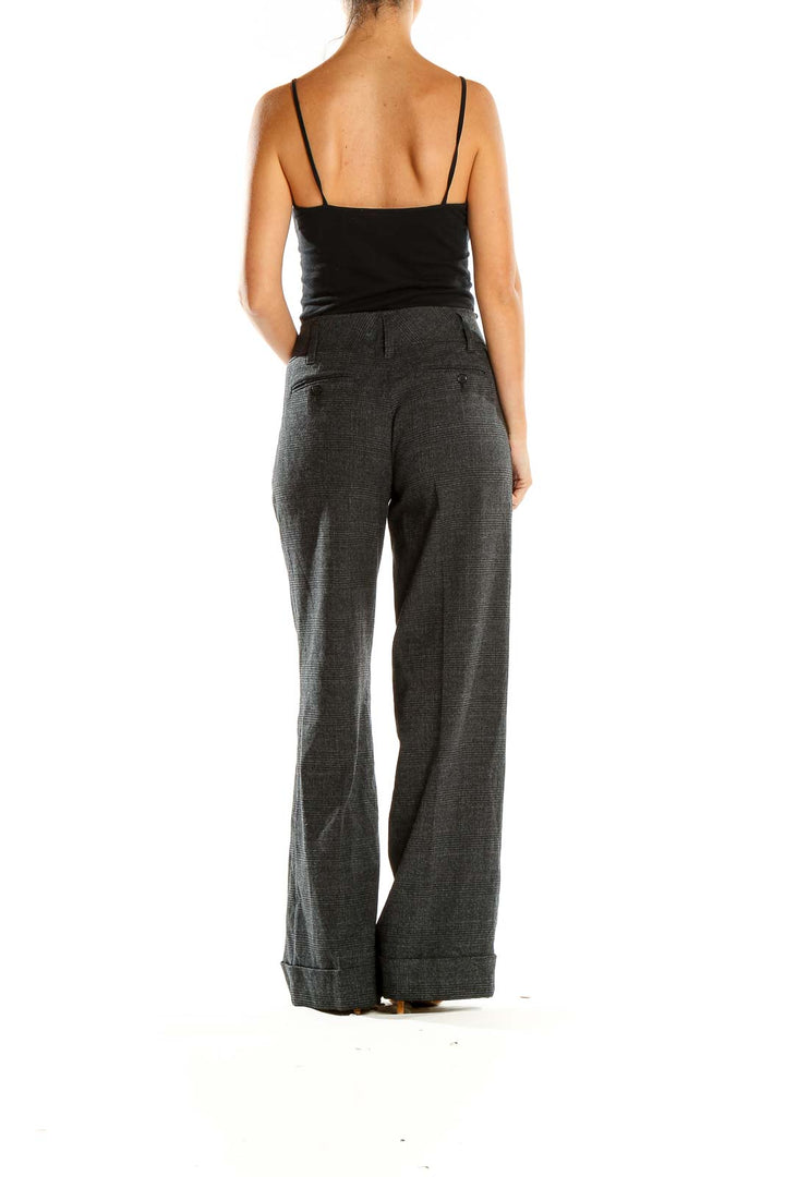 Side view of MICHAEL Michael Kors gray plaid wide-leg trousers on model