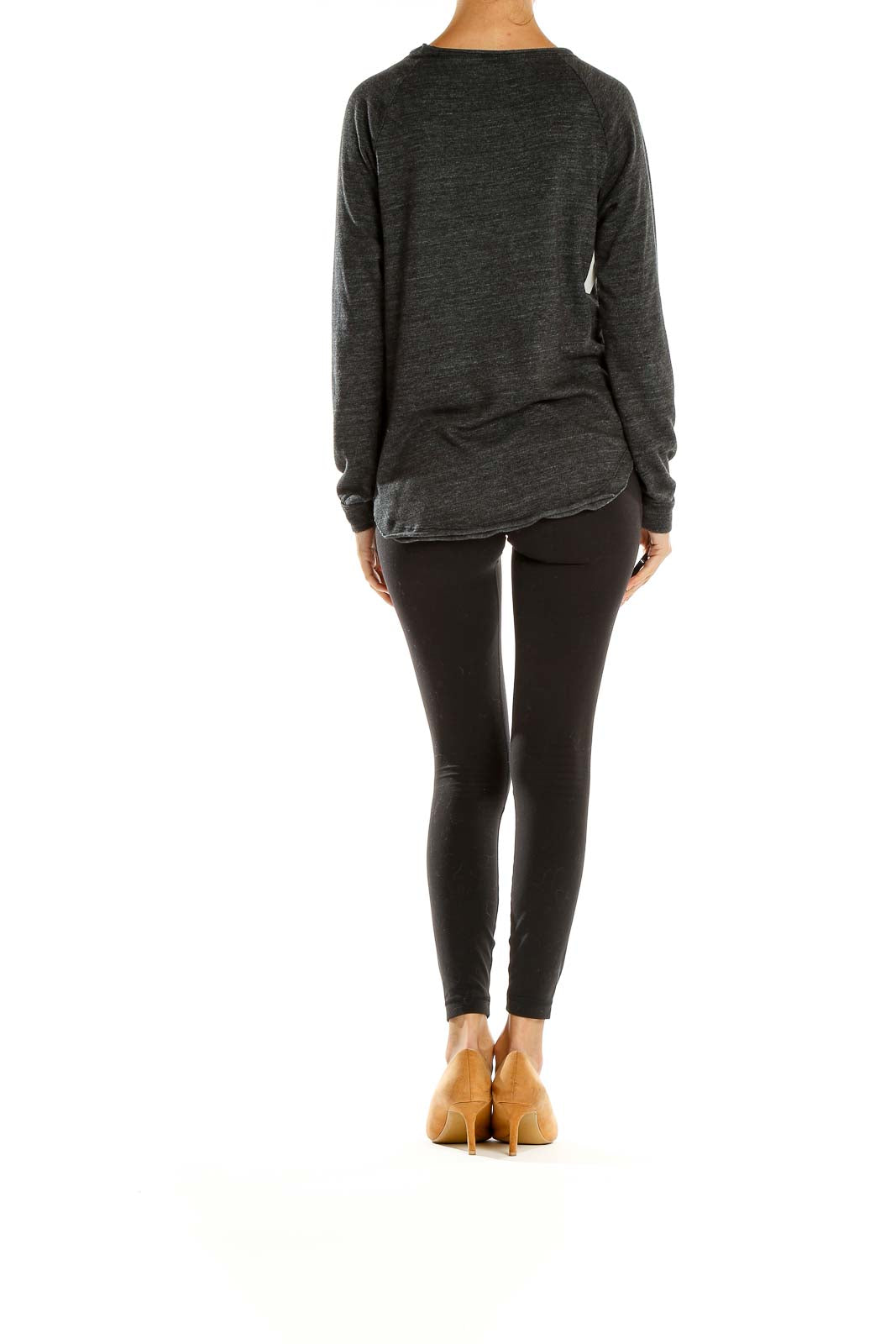 Side view of model wearing Splendid charcoal heather long-sleeve top with black leggings