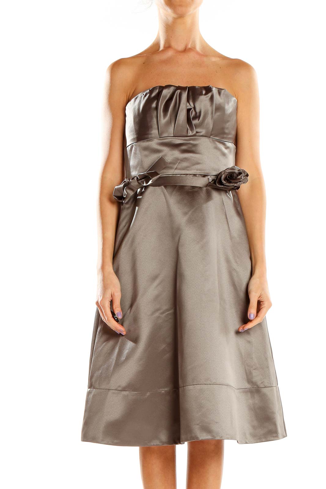 Front view of BCBG MaxAzria taupe strapless cocktail dress with floral waist detail