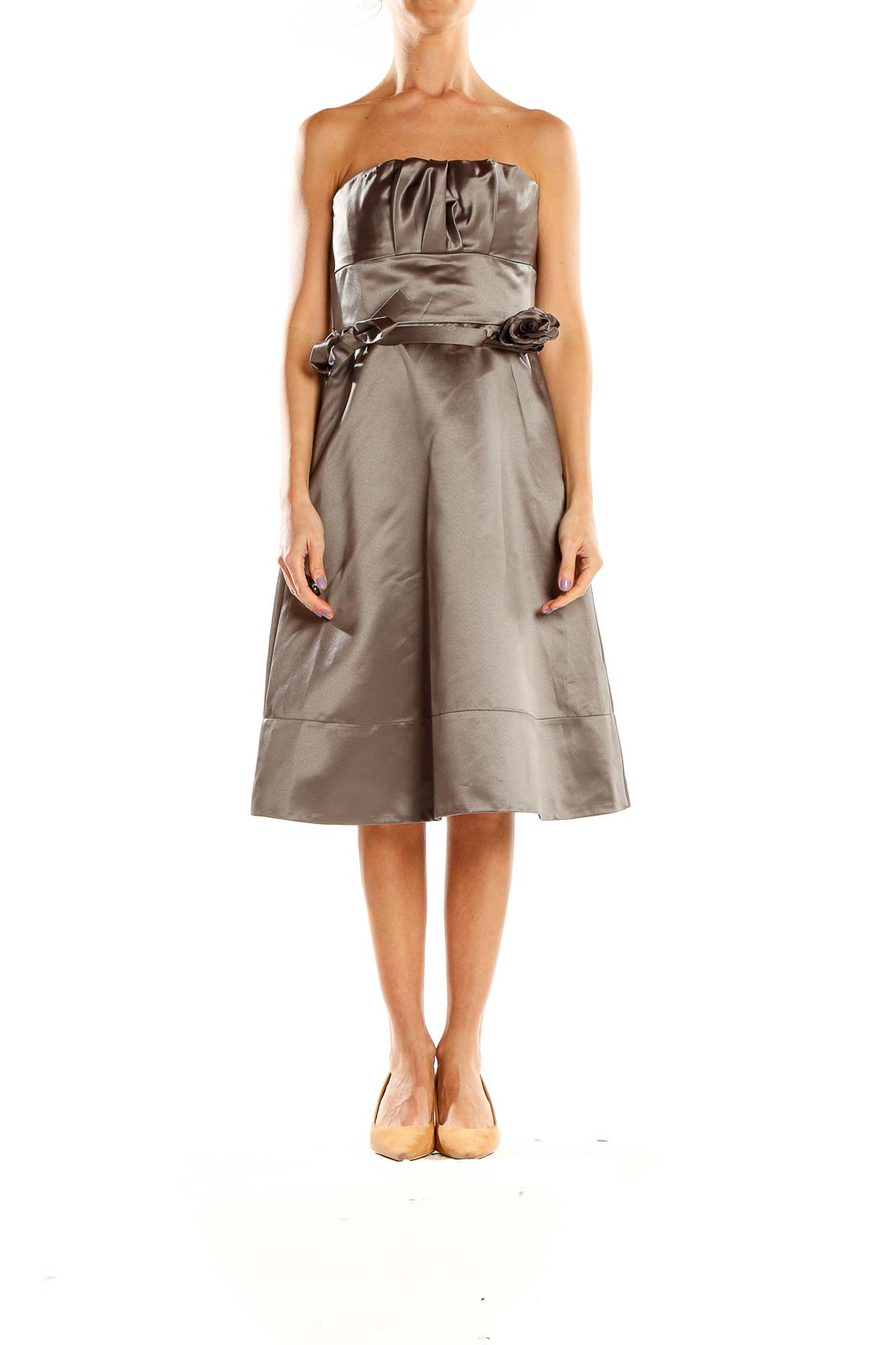 Front view of BCBG MaxAzria taupe strapless cocktail dress with floral waist detail