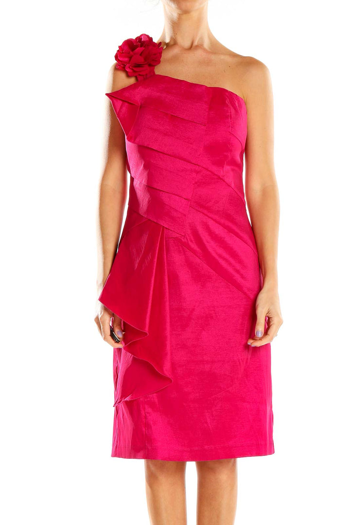 Front view of hot pink one-shoulder cocktail dress with floral accent