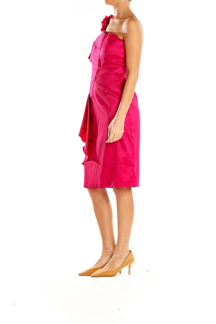 Front view of hot pink one-shoulder cocktail dress with floral accent