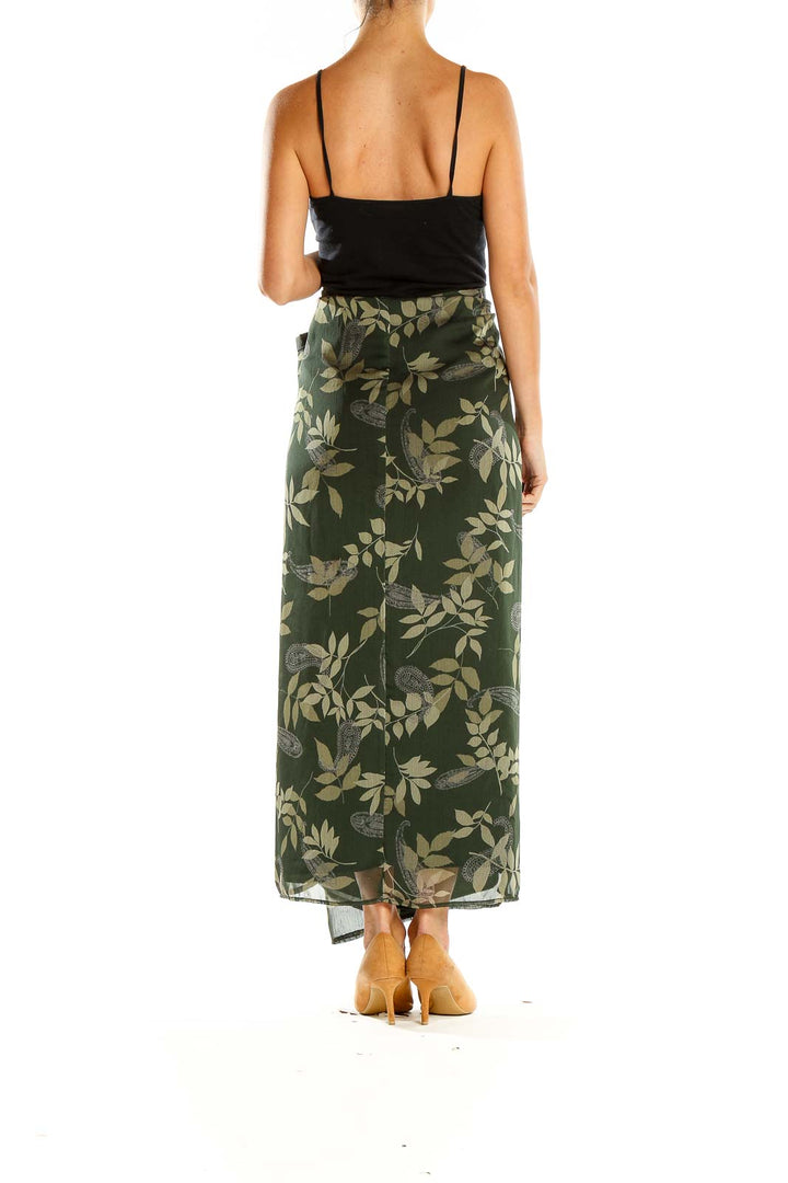 Side view of Maggie McNaughton green floral maxi skirt showing A-line silhouette
