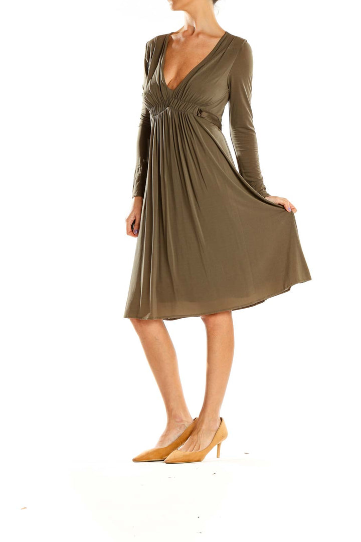 Front view of olive BCBG MaxAzria empire waist V-neck midi dress