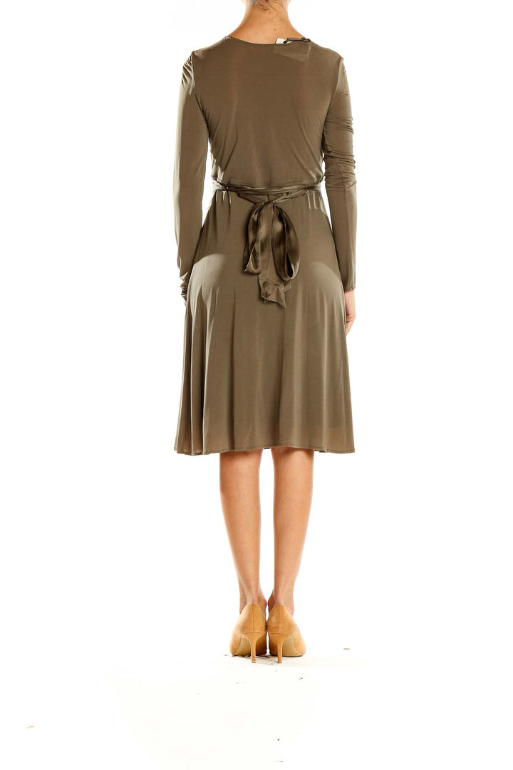 Back view of olive BCBG MaxAzria empire waist V-neck midi dress