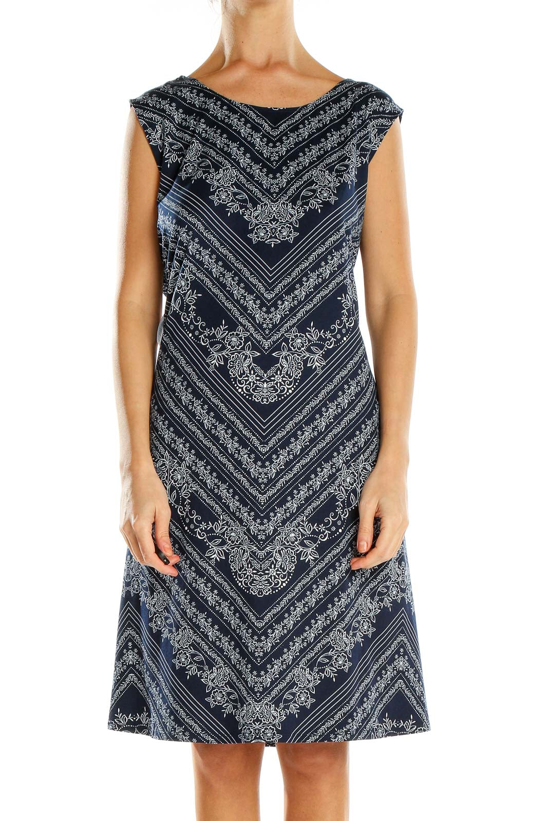 Front view of Nine Britton Navy Floral Paisley Chevron Midi Dress on model