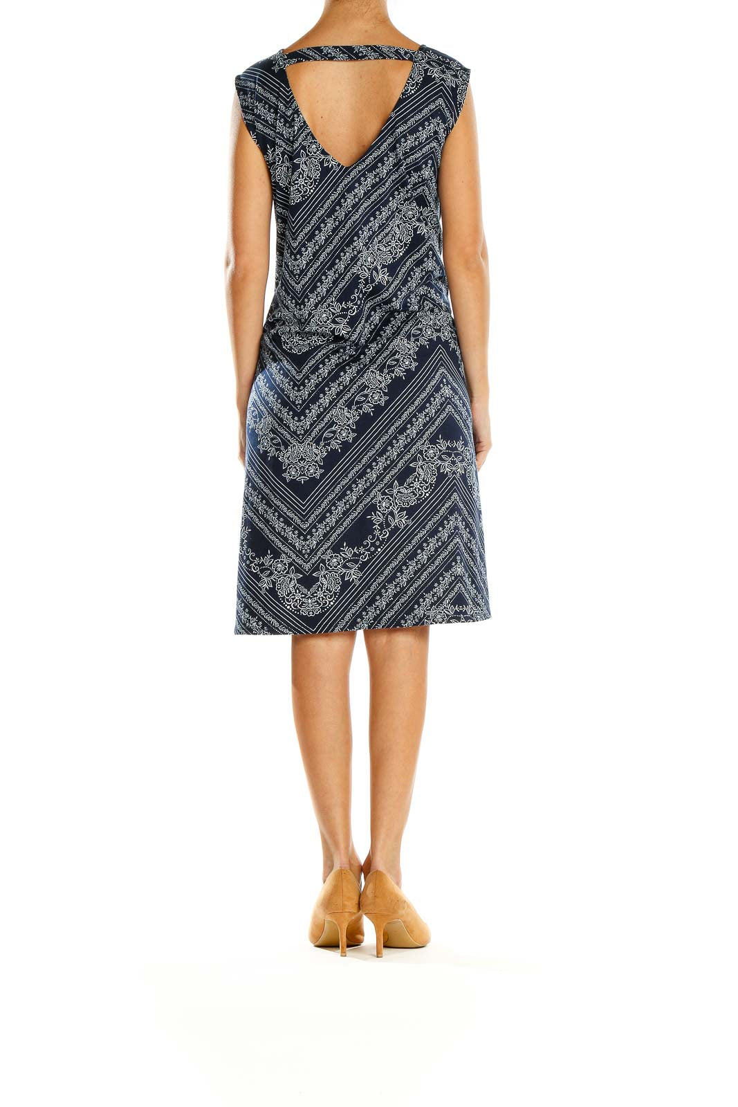 Back view of Nine Britton Navy Floral Paisley Chevron Midi Dress on model