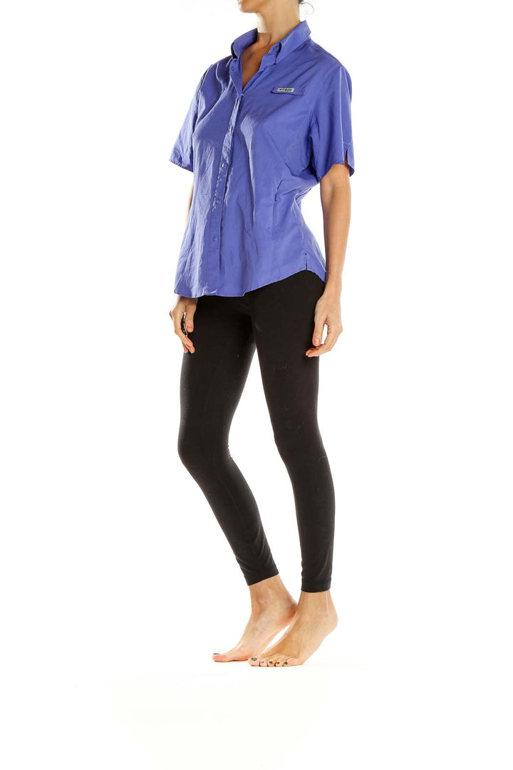 Front view of Columbia purple short-sleeve button-up activewear shirt