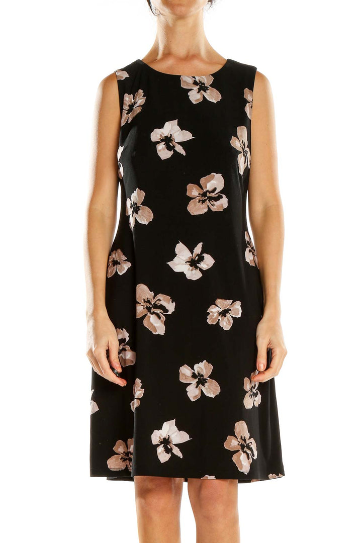 Front view of Tommy Hilfiger black sleeveless dress with pink and white floral print