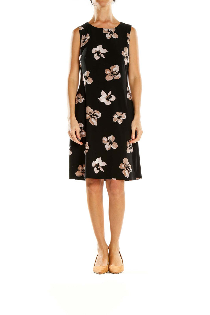 Front view of Tommy Hilfiger black sleeveless dress with pink and white floral print