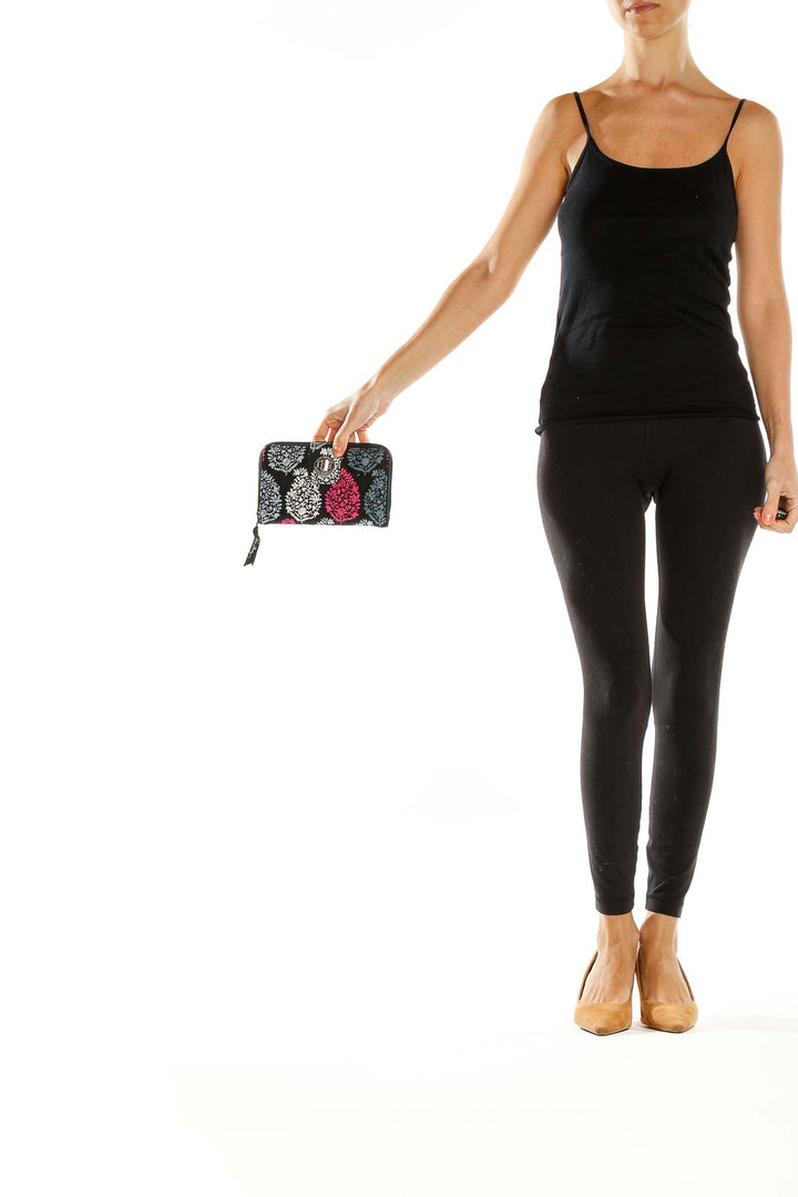 Front view of Vera Bradley black clutch with gray and pink floral print
