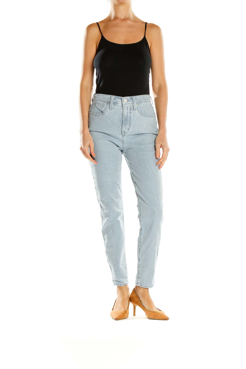 Front view of Madewell light blue striped high-waisted jeans on model