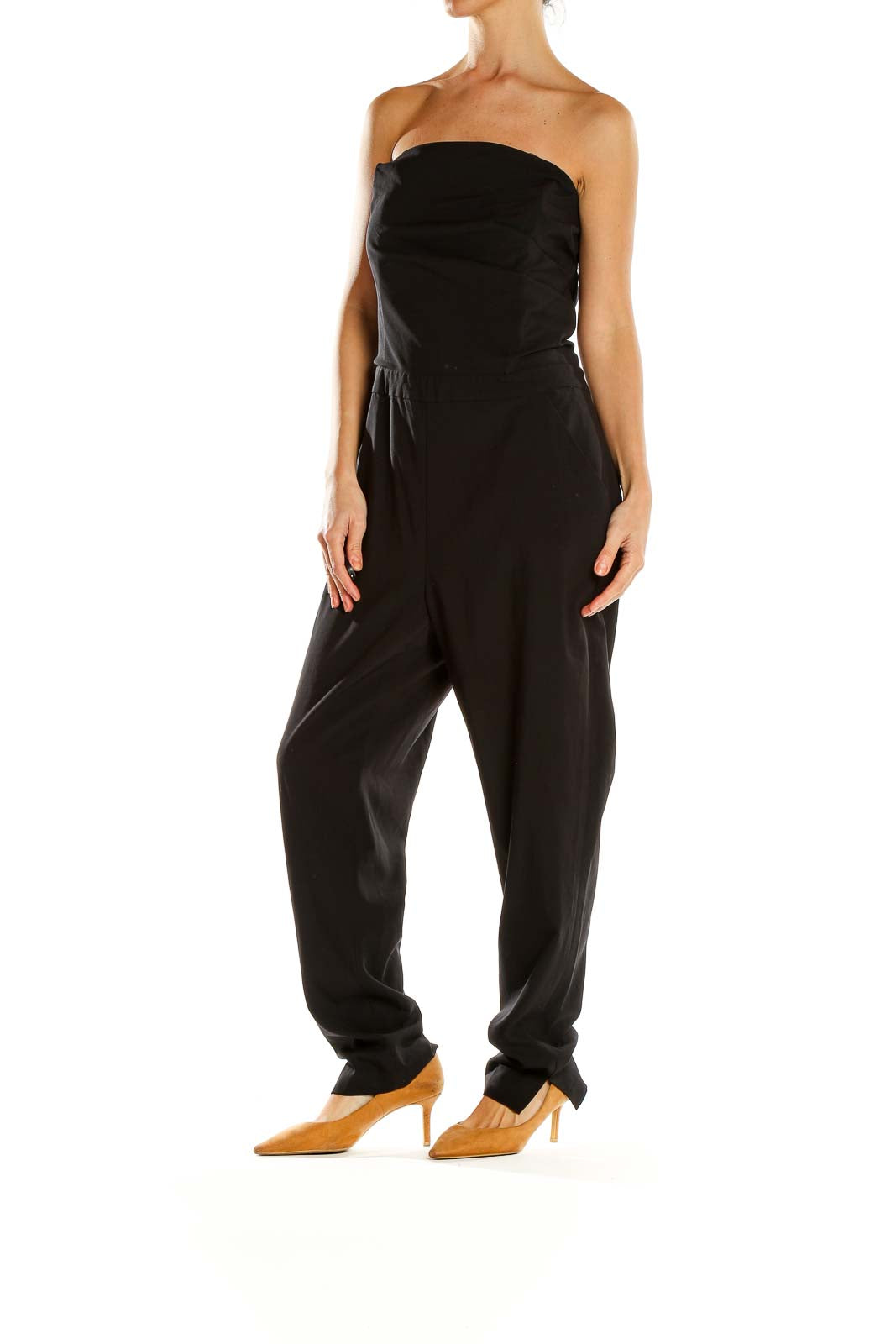 Front view of black strapless jumpsuit by Silence + Noise