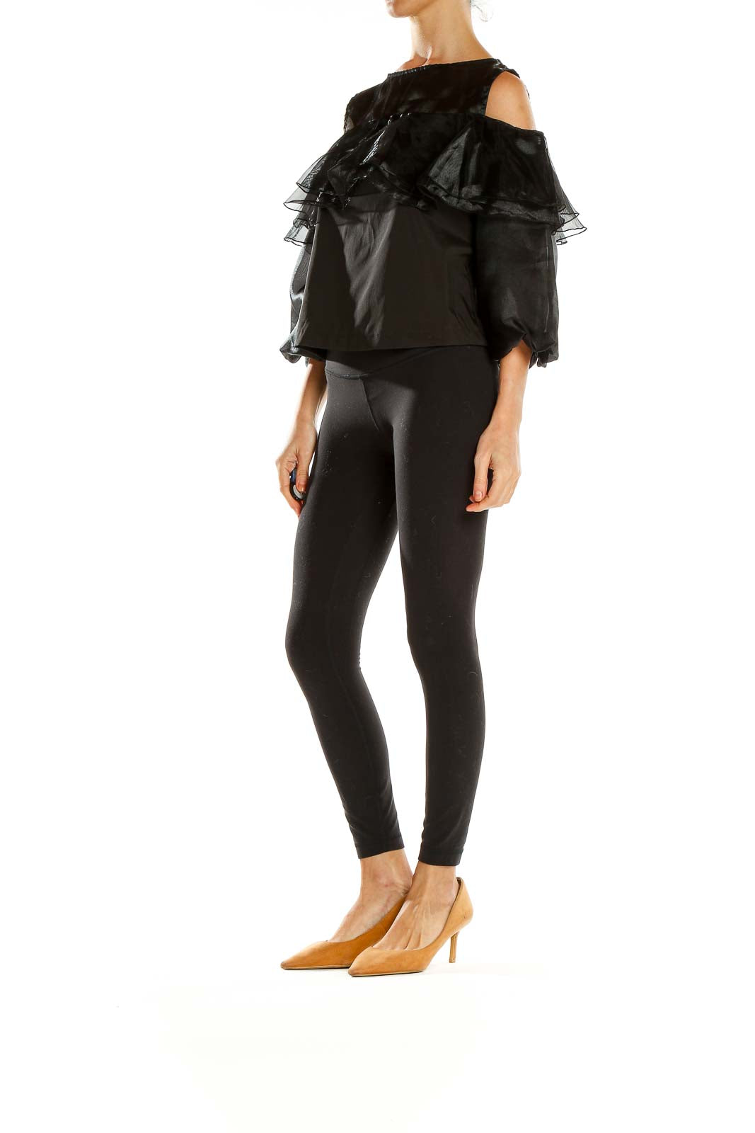 Front view of black ruffled cold-shoulder top by Twist x Turn