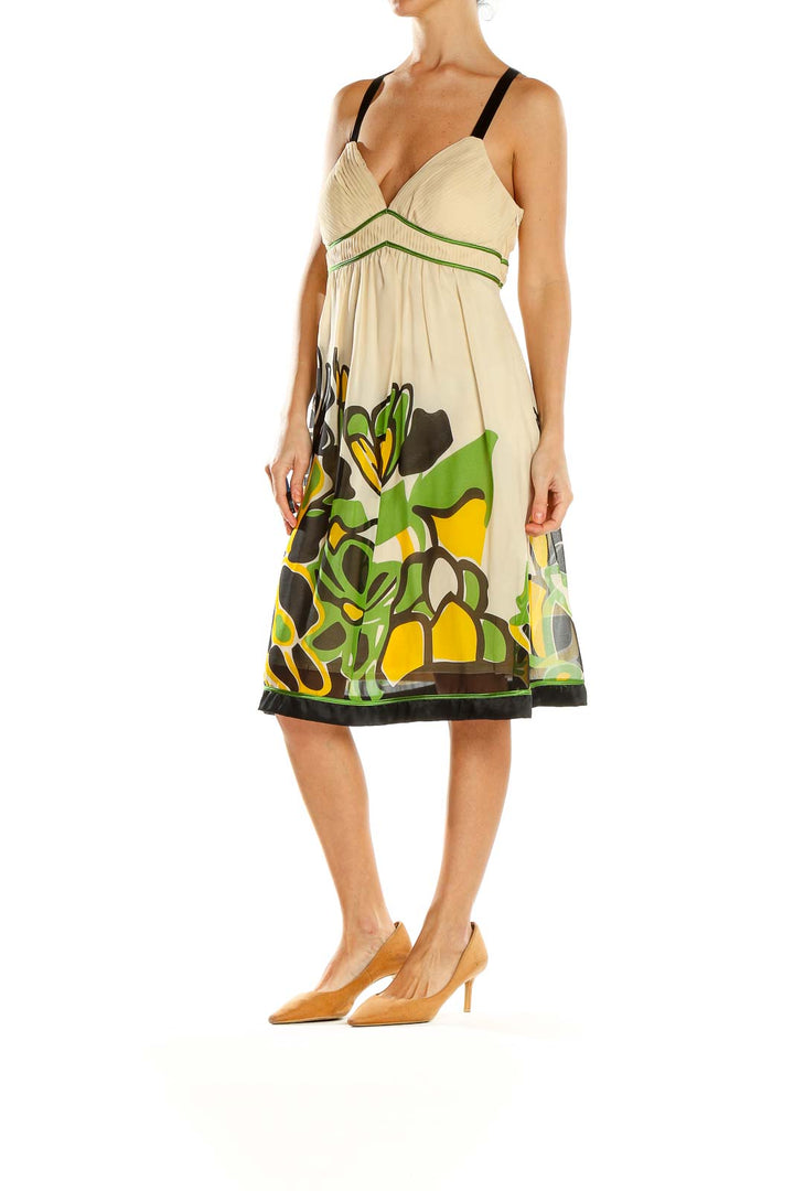 Front view of Sue Wong cream floral print empire waist dress
