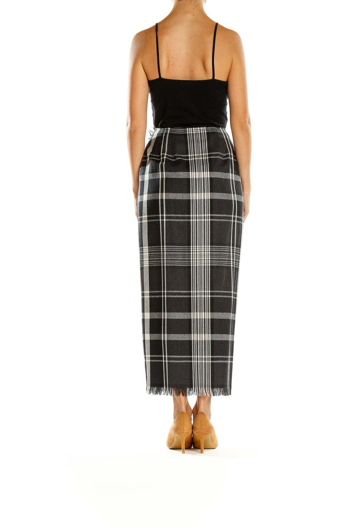 Side view of Adrienne Vittadini black and white plaid maxi skirt on model