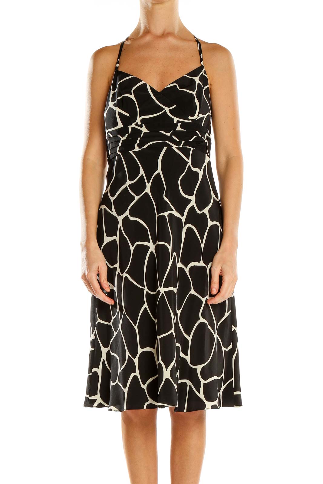 Front view of Ann Taylor black and white giraffe print halter dress