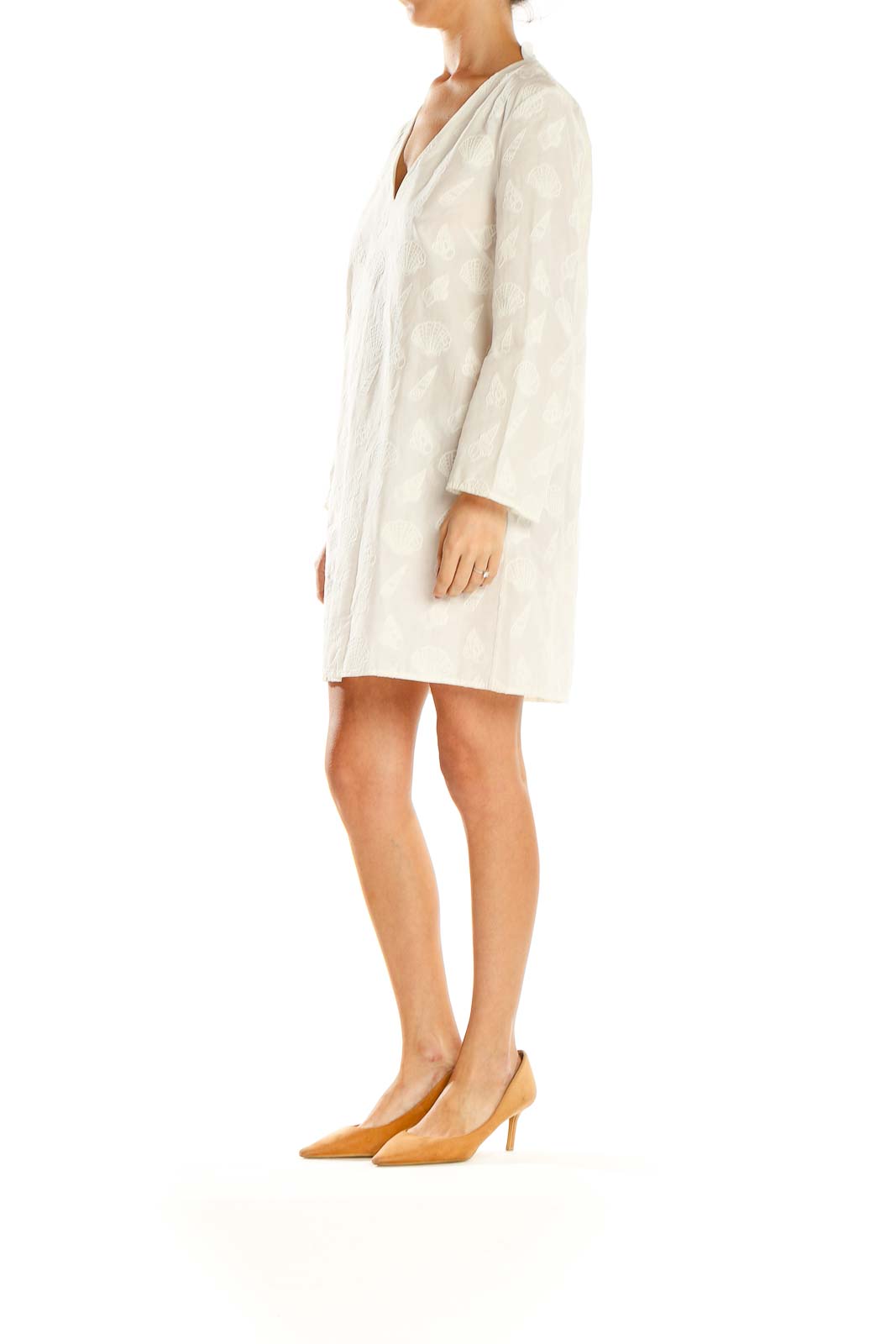 Front view of white embroidered V-neck shift dress from & Other Stories