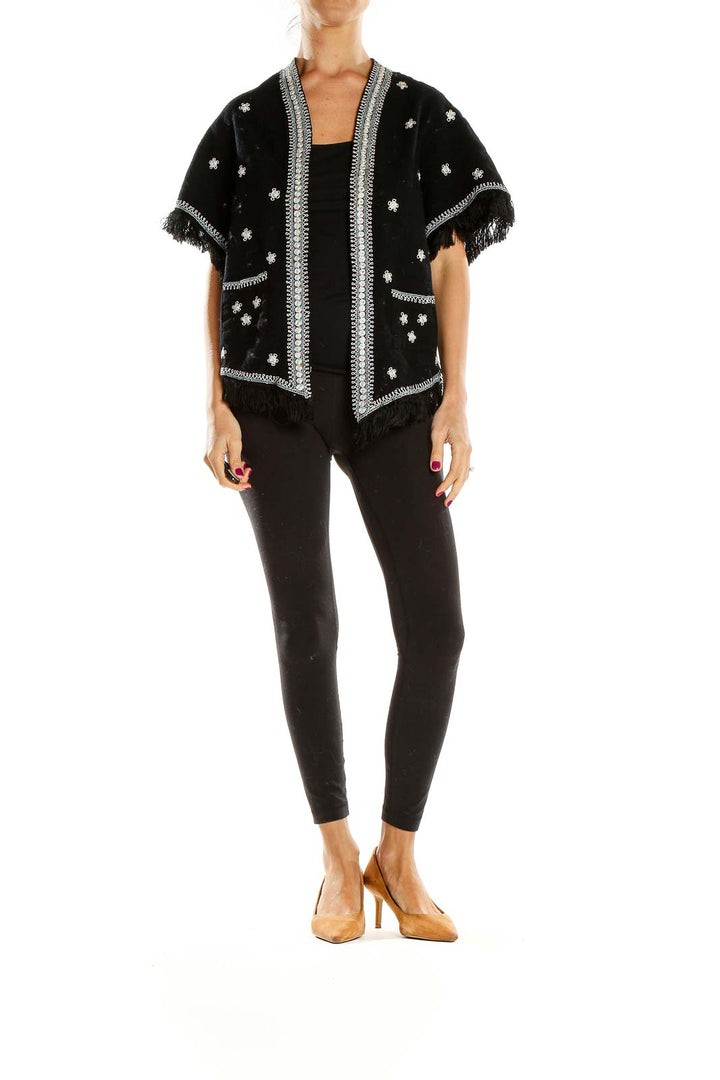 Front view of SilkRoll black embellished jacket with silver floral embroidery and fringe details