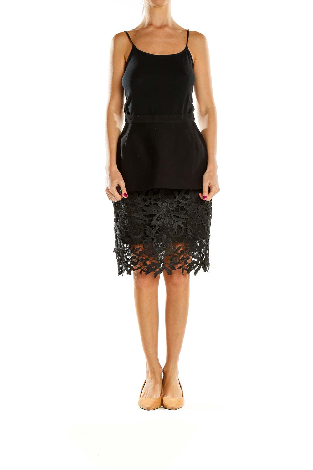 Front view of Cameo The Label black peplum skirt with lace overlay