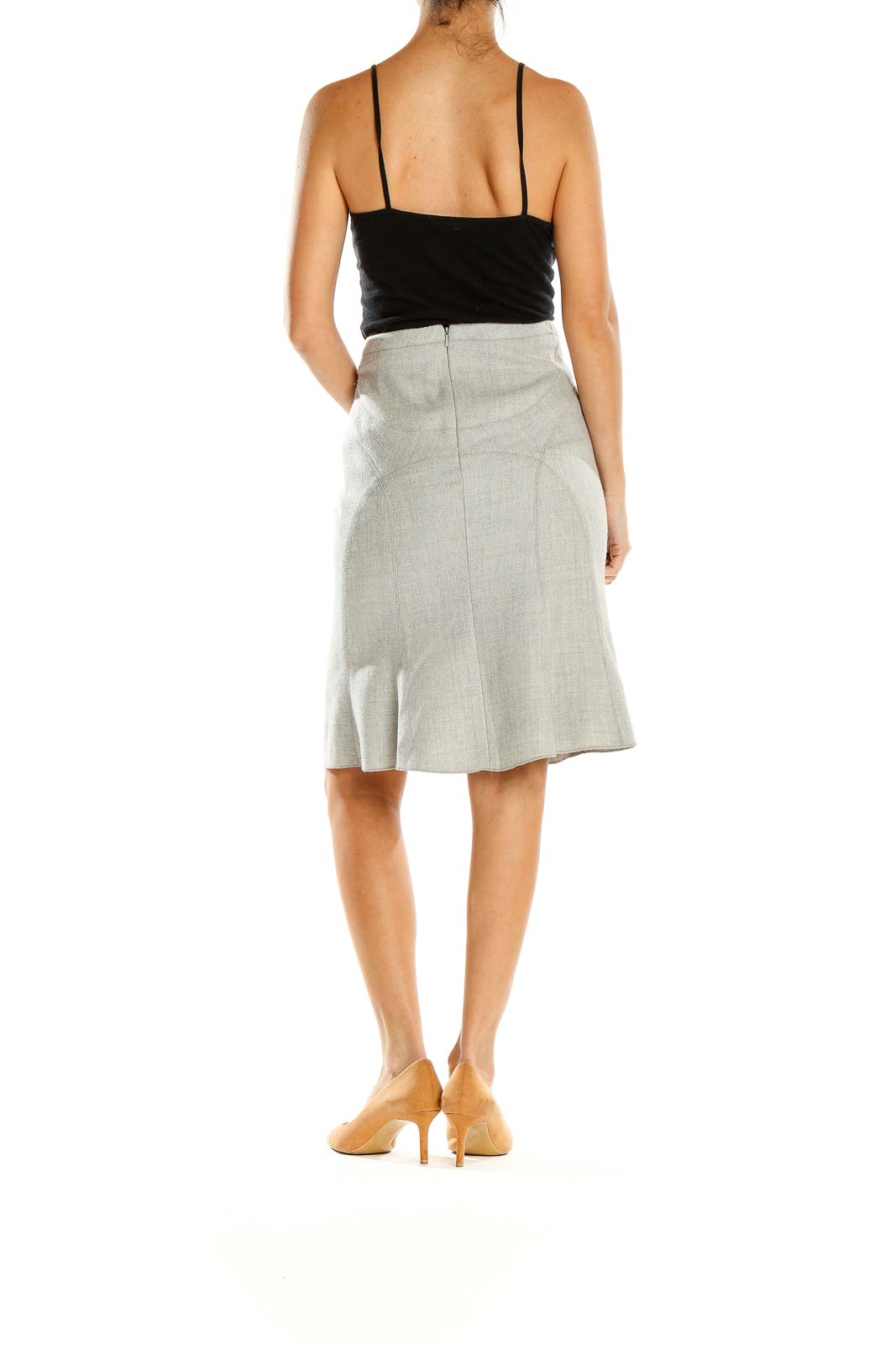 Side view of BCBG MaxAzria light gray A-line knee-length skirt on model