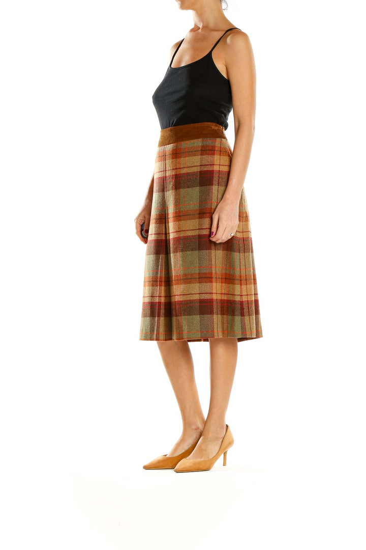 Front view of Les Copains brown plaid wool midi skirt with A-line silhouette