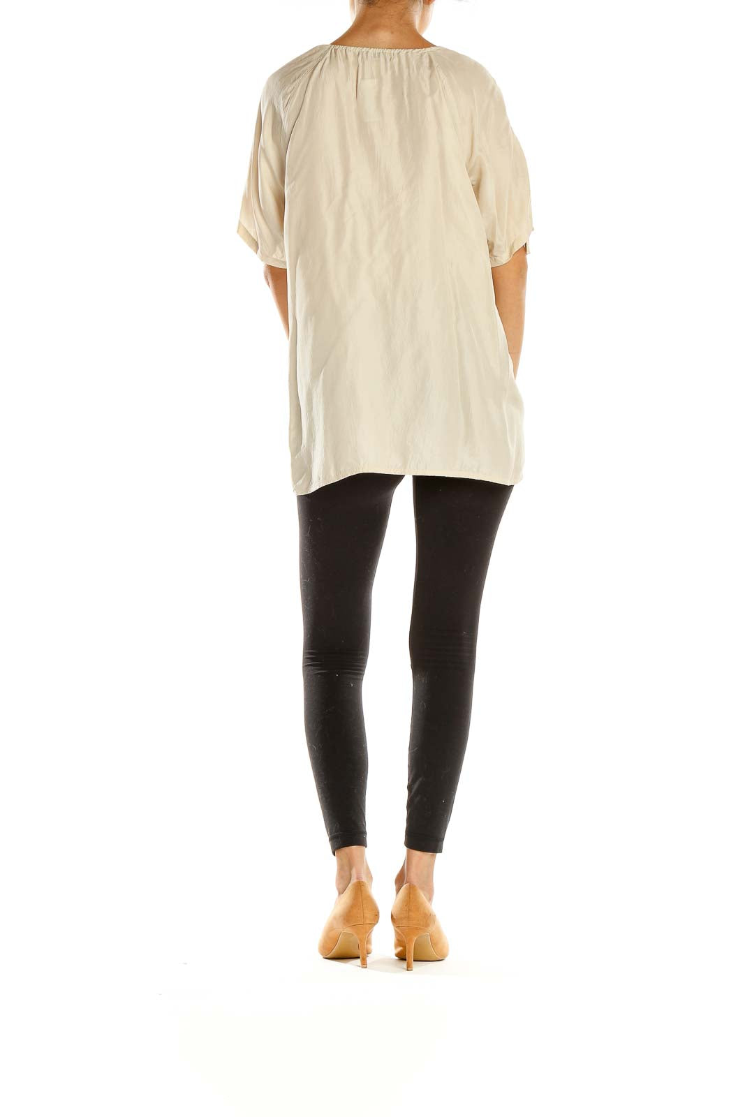 Side view of beige Banana Republic peasant blouse on model