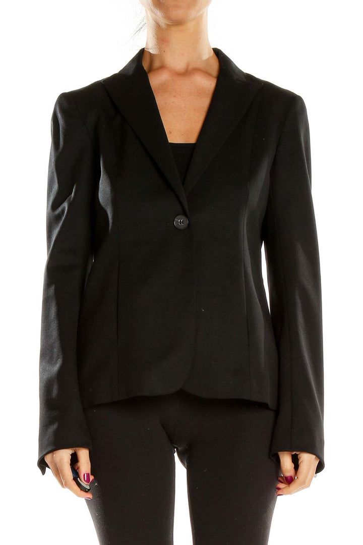 Front view of black Theory blazer with single-button closure