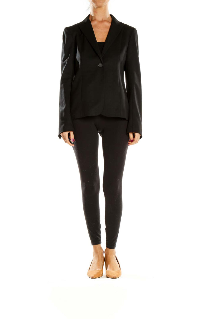 Front view of black Theory blazer with single-button closure