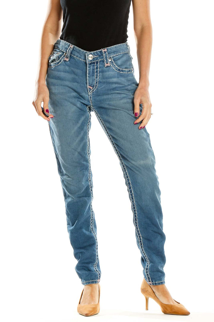 Front view of True Religion light blue straight leg jeans on model