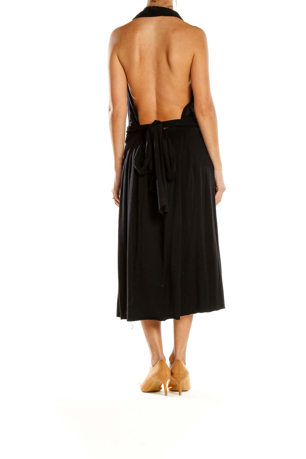 Side view of black Theory halter neck midi dress showing pleated skirt and fitted waist