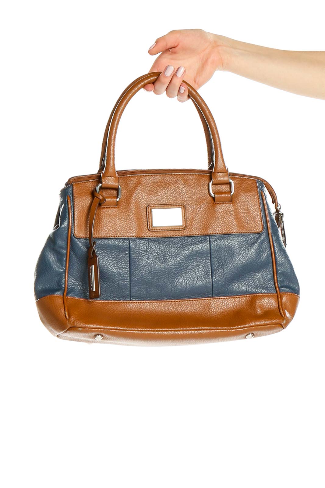 Front view of Tignanello brown and blue leather satchel held by hand