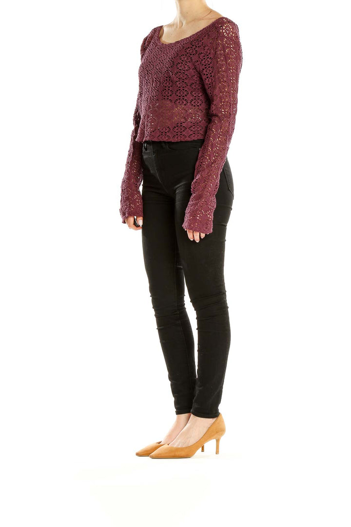 Front view of burgundy crochet crop sweater from FP Beach