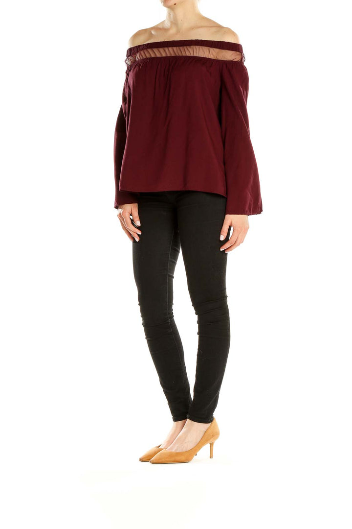 Front view of burgundy Rock & Republic off-shoulder top with sheer panel