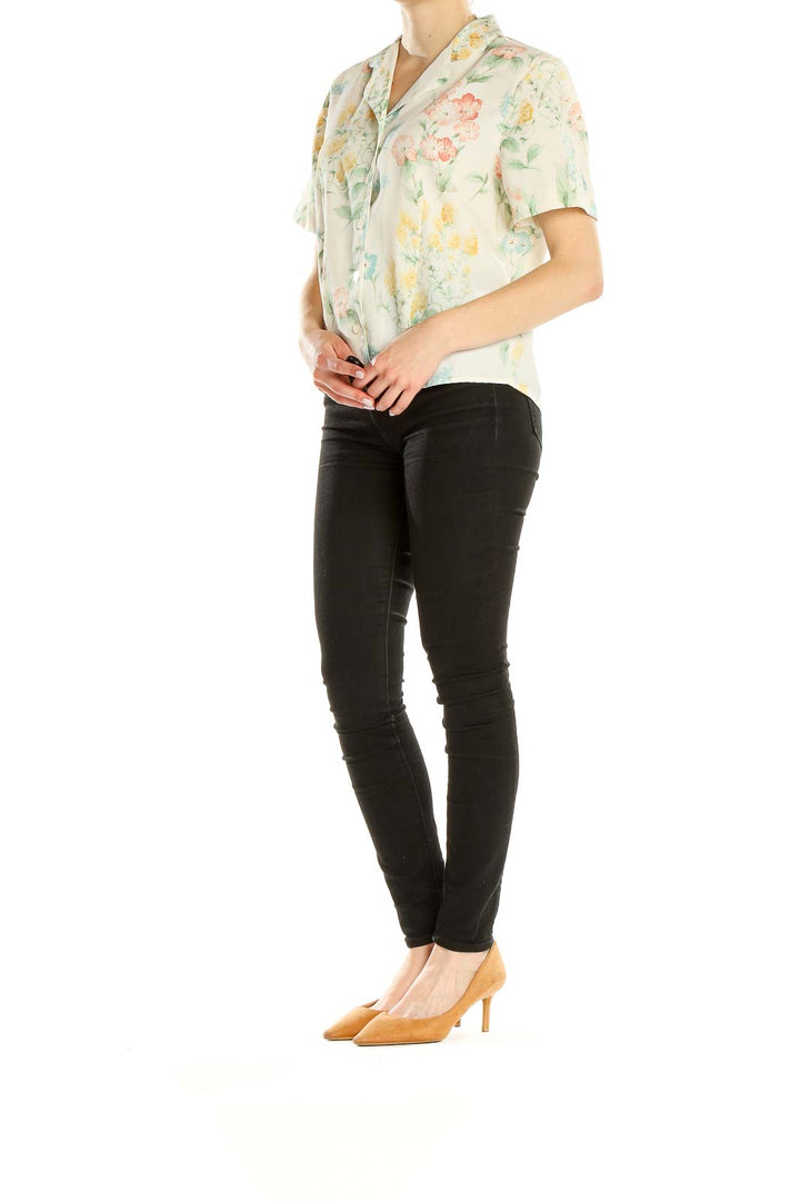 Front view of Alfred Dunner cream floral short-sleeve button-up blouse