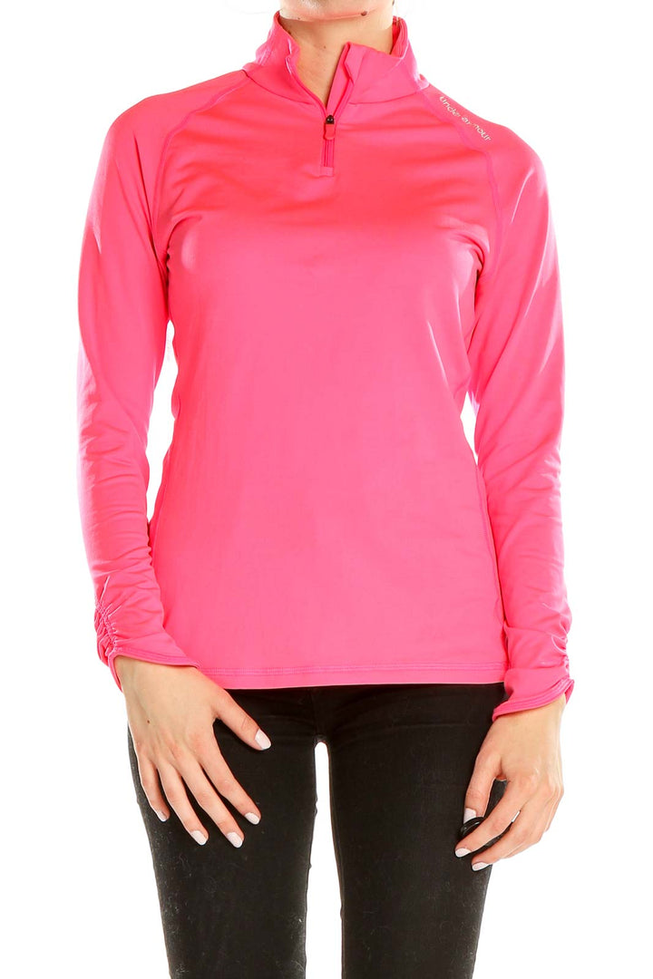 Front view of pink Under Armour quarter-zip performance top
