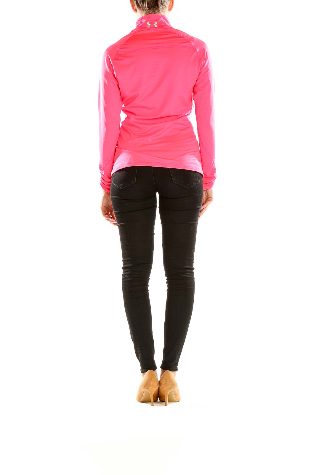 Side view of woman wearing pink Under Armour quarter-zip performance top