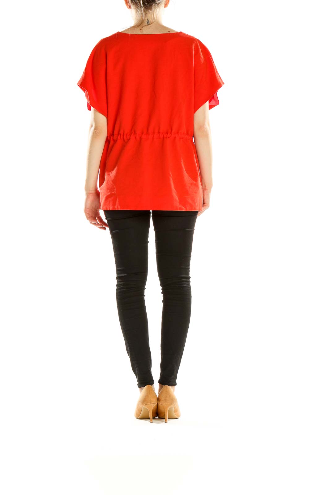 Side view of red wrap-style peplum top from ASOS showing waist tie and peplum hem