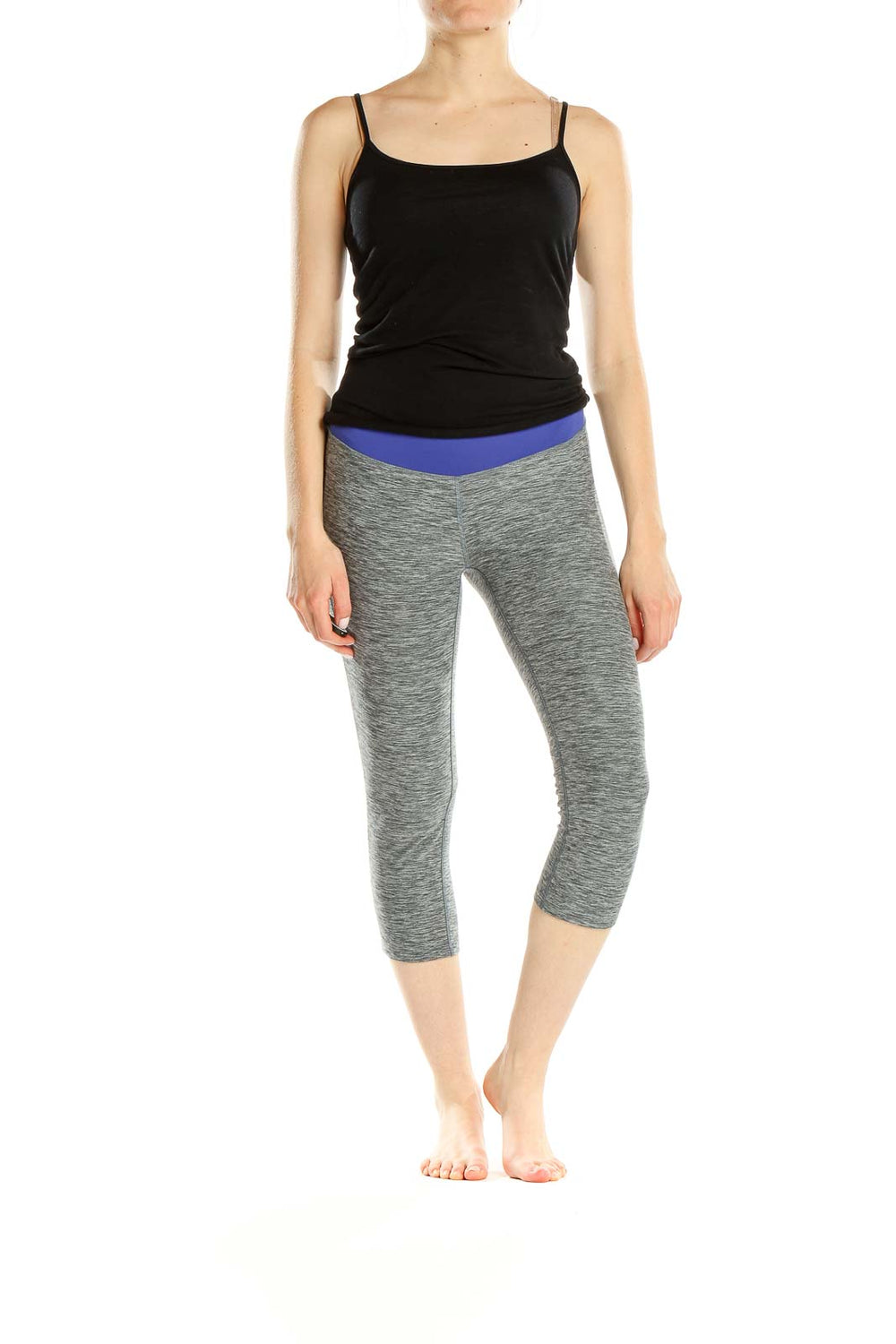 Front view of gray heathered New Balance capri leggings with blue waistband