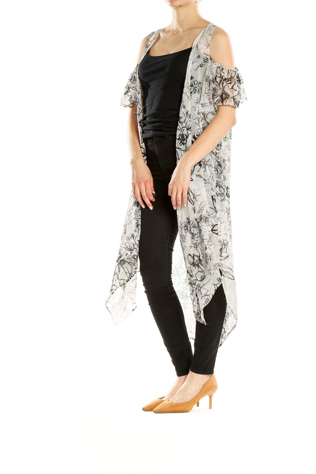 Front view of BCBGeneration white floral cold-shoulder duster cardigan