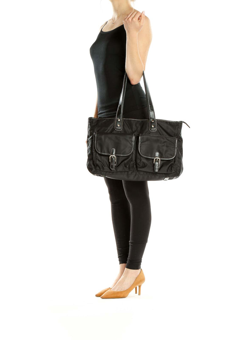 Front view of Leslie Fay black nylon tote bag with two front pockets