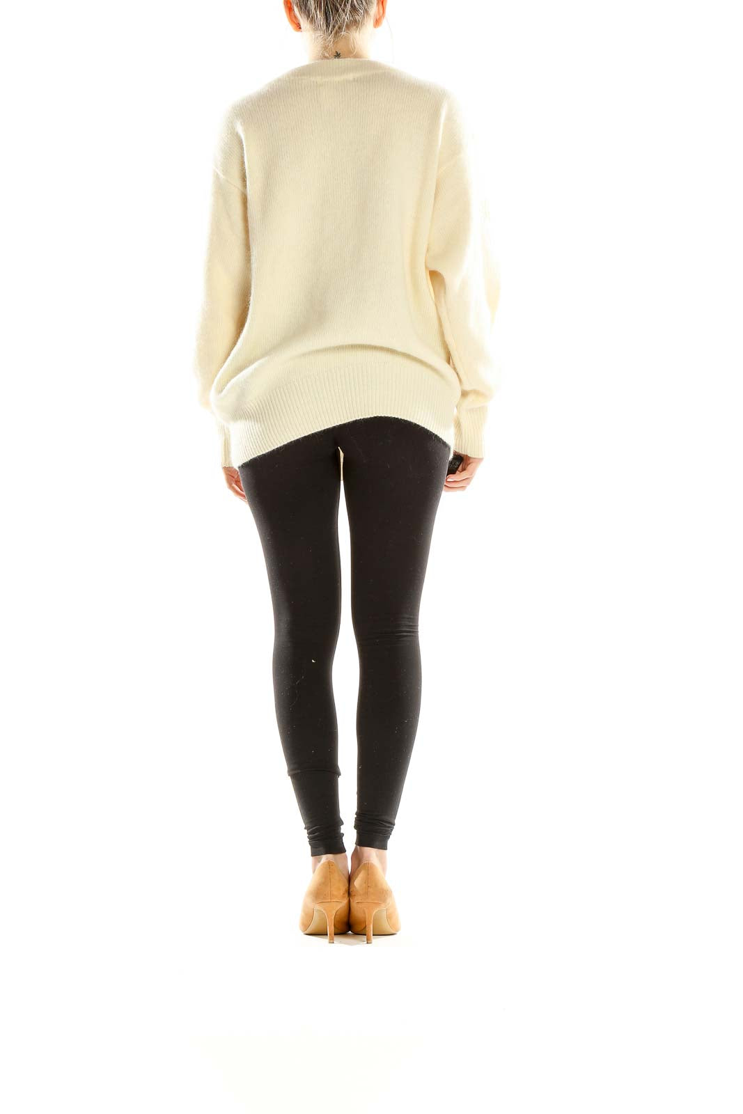 Side view of cream Apart oversized knit sweater showing sequin details and relaxed fit
