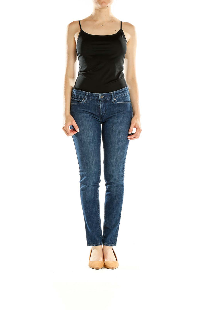 Front view of Levi's classic blue straight leg jeans on model