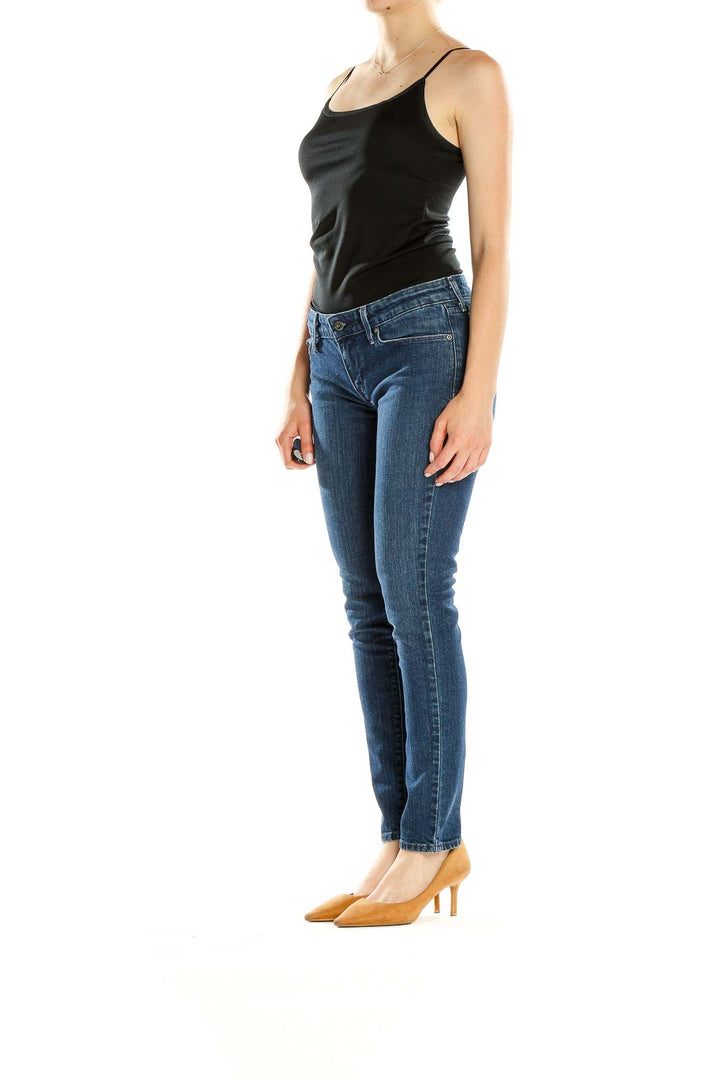 Front view of Levi's classic blue straight leg jeans on model