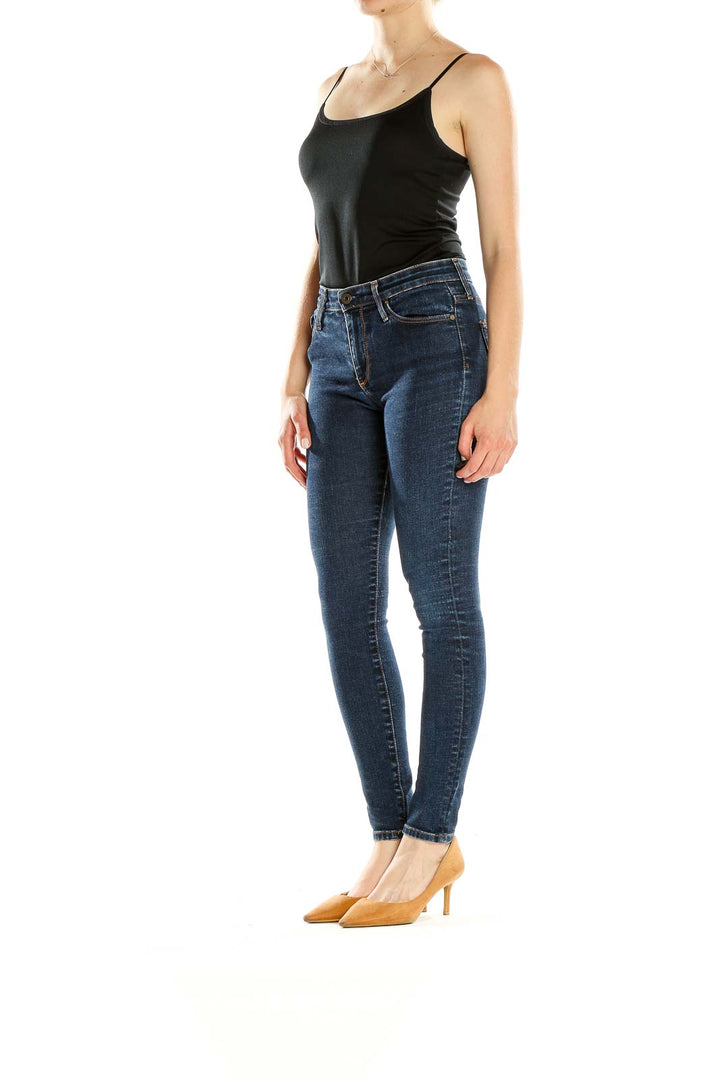 Front view of Adriano Goldschmied dark blue skinny jeans on model